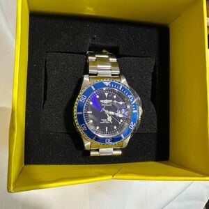 Invicta Stainless Steel Watch with Yellow Accents